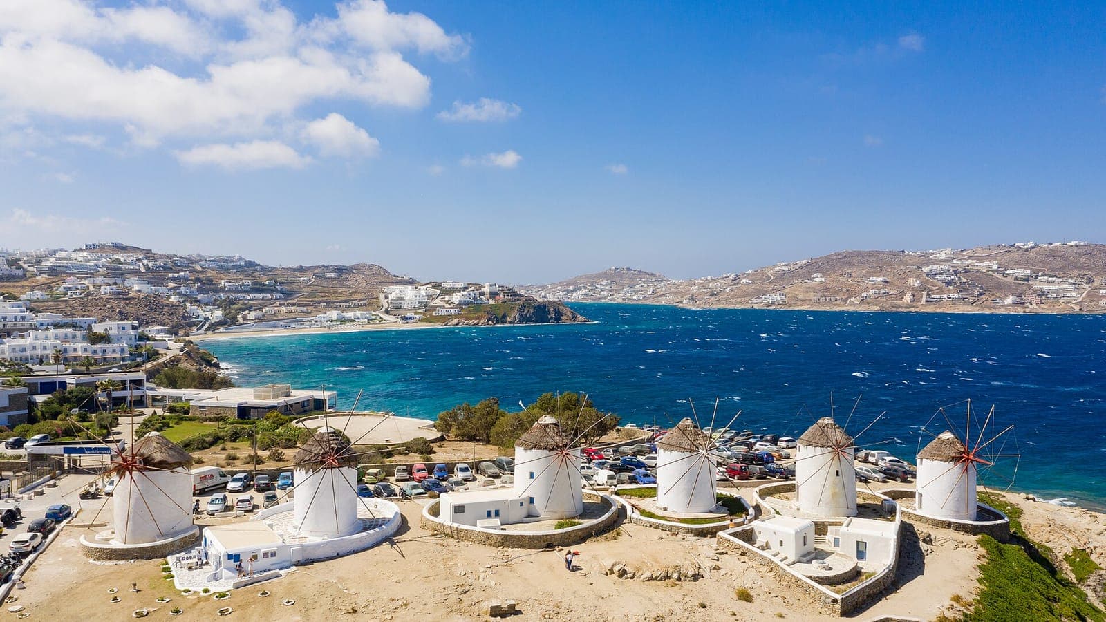 The windmills of Mykonos above the deep-blue Aegean