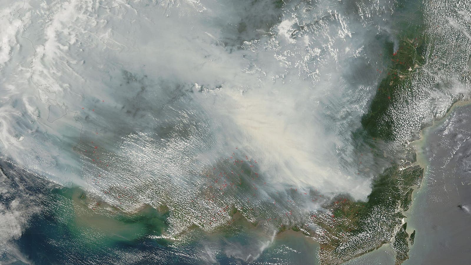 Satellite view of smoke from fires drifting over Borneo